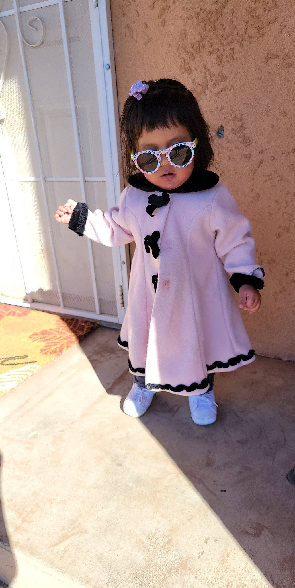 Isabella joined the competition — help win amazing prizes! baby_toddler_clothing, blazer, bow_tie, denim, doll, eyewear, fashion_design, formal_wear, glasses, goggles, jacket, pattern, person, shoe, sleeve, sneakers, street_fashion, sunglasses, toddler, toy