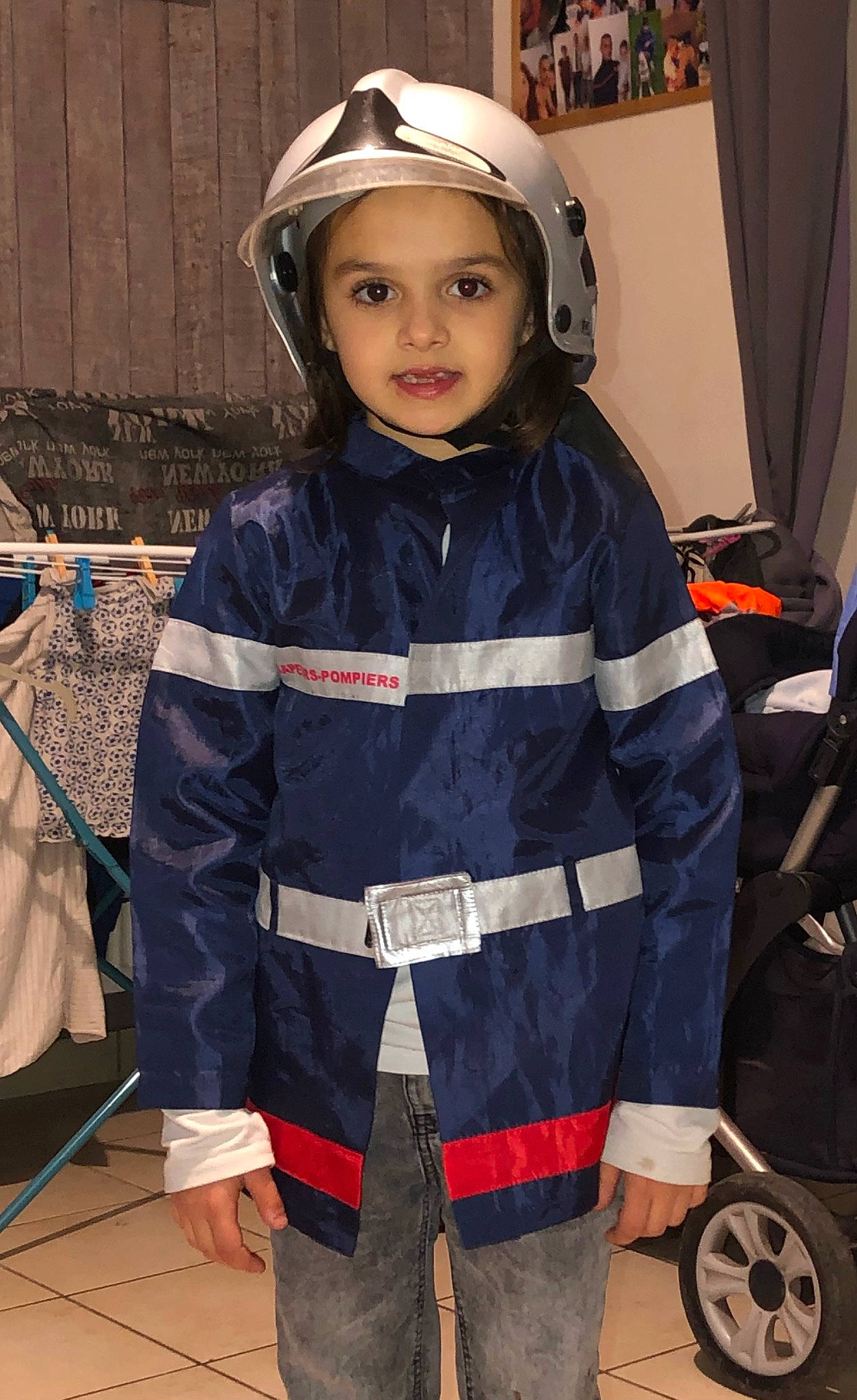 Shayna participe au concours pour gagner de l'argent avec cette photo : belt, costume, curtain, electric_blue, eyewear, fashion_accessory, fashion_design, flooring, fun, glove, headwear, helmet, person, personal_protective_equipment, sleeve, sports_gear, street_fashion, tire, toddler, uniform