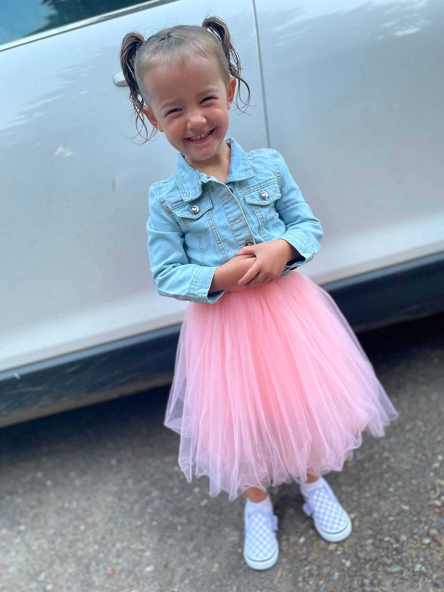 Mckynlee joined the competition — help win amazing prizes! automotive_exterior, automotive_lighting, azure, baby_toddler_clothing, ballet_tutu, bumper, car, electric_blue, face, fun, happy, hood, joy, magenta, motor_vehicle, person, pink, smile, toddler, vehicle