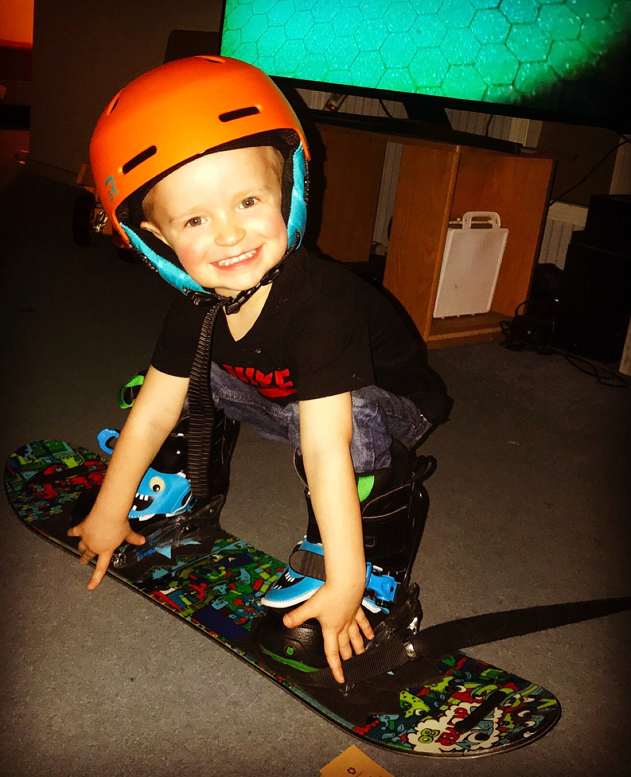 Mavryck is registered to the contest to win money with this photo: cap, child, footwear, fun, headgear, headwear, helmet, joy, longboard, person, personal_protective_equipment, play, recreation, skateboard, skateboarding_equipment, sports_equipment, toddler