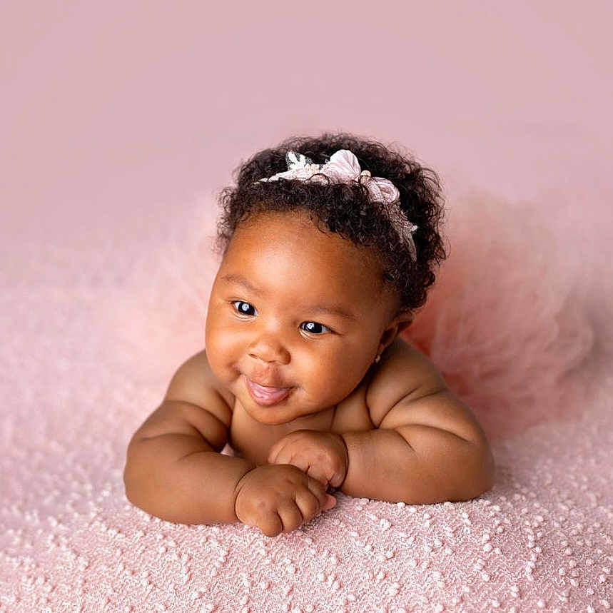Rumanii is registered to the contest to win money with this photo: accessories, baby, babylaughing, biting, bodypart, face, finger, hand, happy, head, newborn, person, photography, portrait, sitting, smile