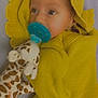 Jad joined the competition — help win amazing prizes! baby, infant, pacifier, yellow_blanket, knitted, hood, plush_toy, giraffe_toy, wrapped, cute, child, portrait, soft, cozy, indoor, young, baby_girl, baby_boy, sleepwear, comfort