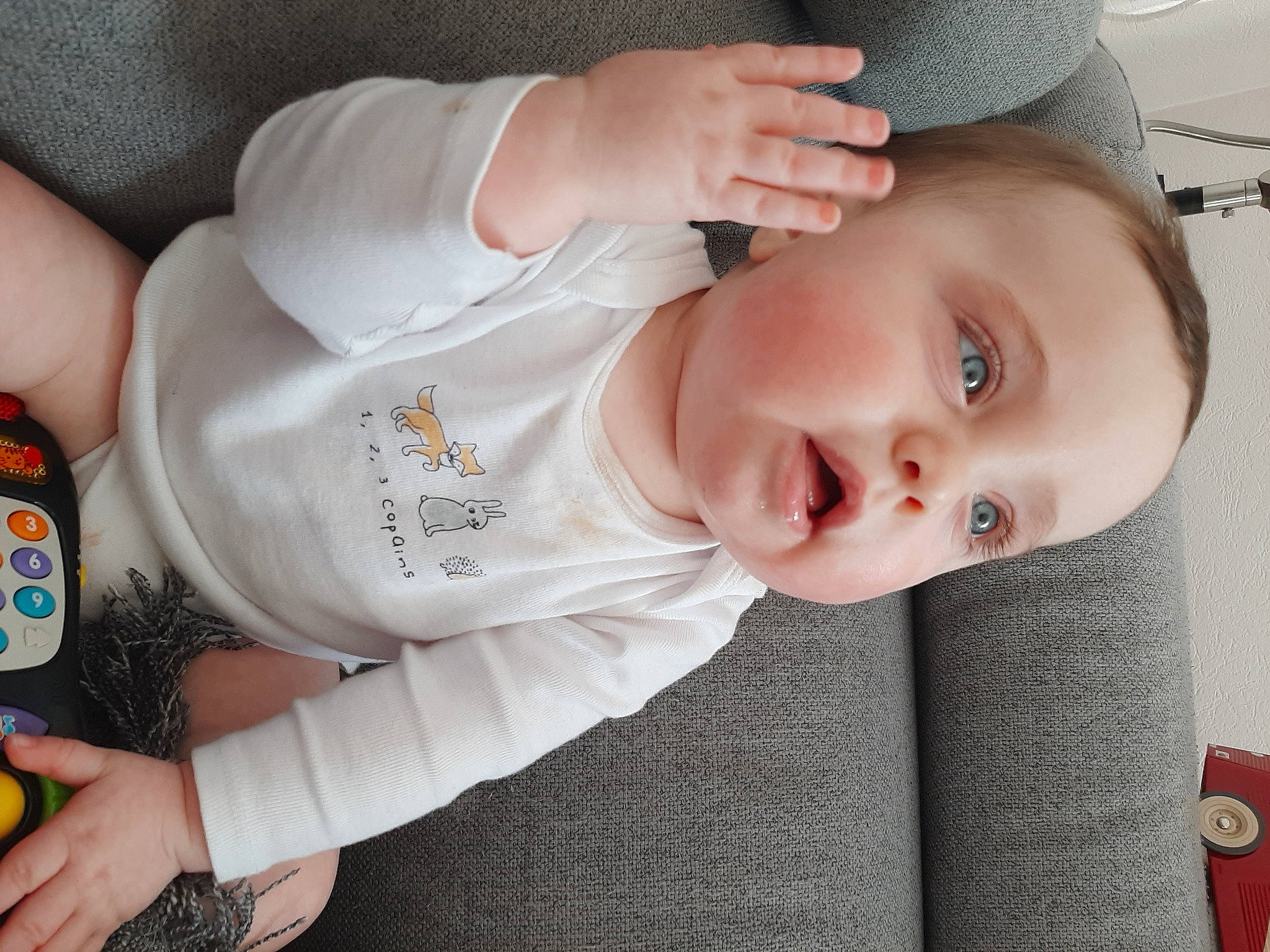 Elyana participe au concours pour gagner de l'argent avec cette photo : baby, baby_products, baby_toddler_clothing, cheek, child, comfort, eyelash, finger, flooring, happy, hat, iris, lip, mouth, nail, neck, nose, person, sleeve, smile