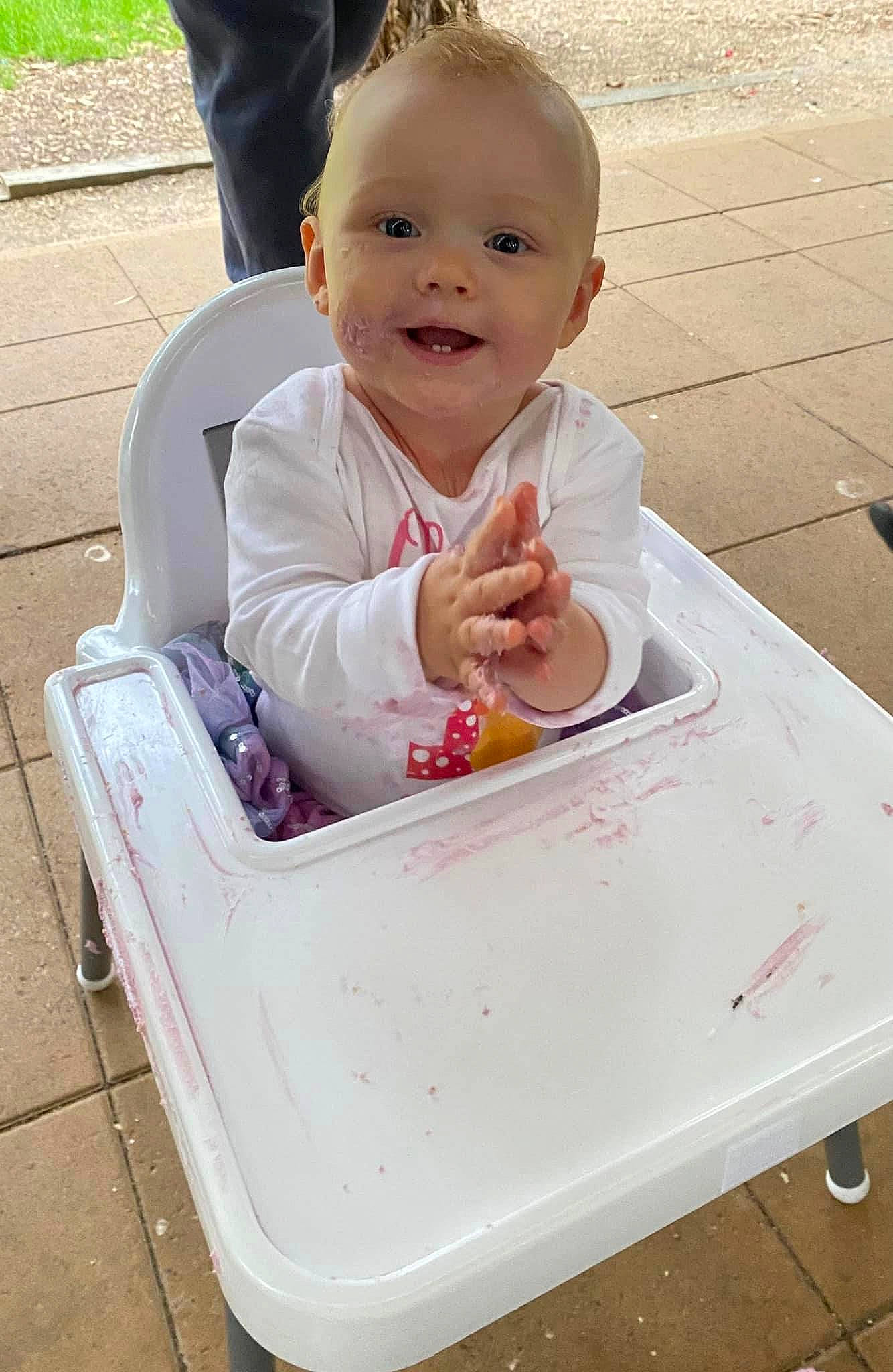 Olivia is registered to the contest to win money with this photo: baby, baby_laughing, baby_products, baby_toddler_clothing, cheek, child, eye, fun, gesture, happy, joy, person, pink, play, sitting, sleeve, smile, table, thumb, toddler