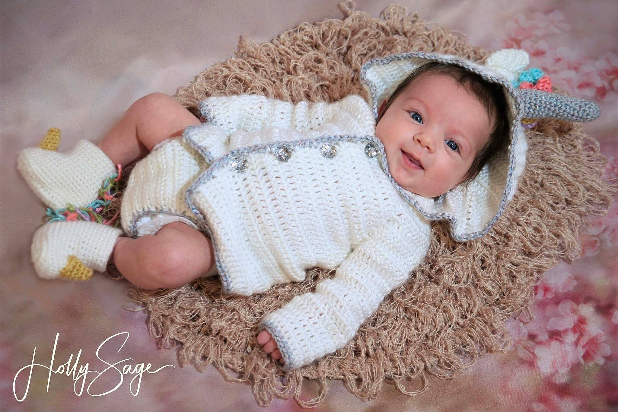 Clementine is registered to the contest to win money with this photo: art, baby, baby_sleeping, baby_toddler_clothing, child, craft, crochet, headgear, knitting, pattern, person, photograph, photography, toddler, wool, woolen