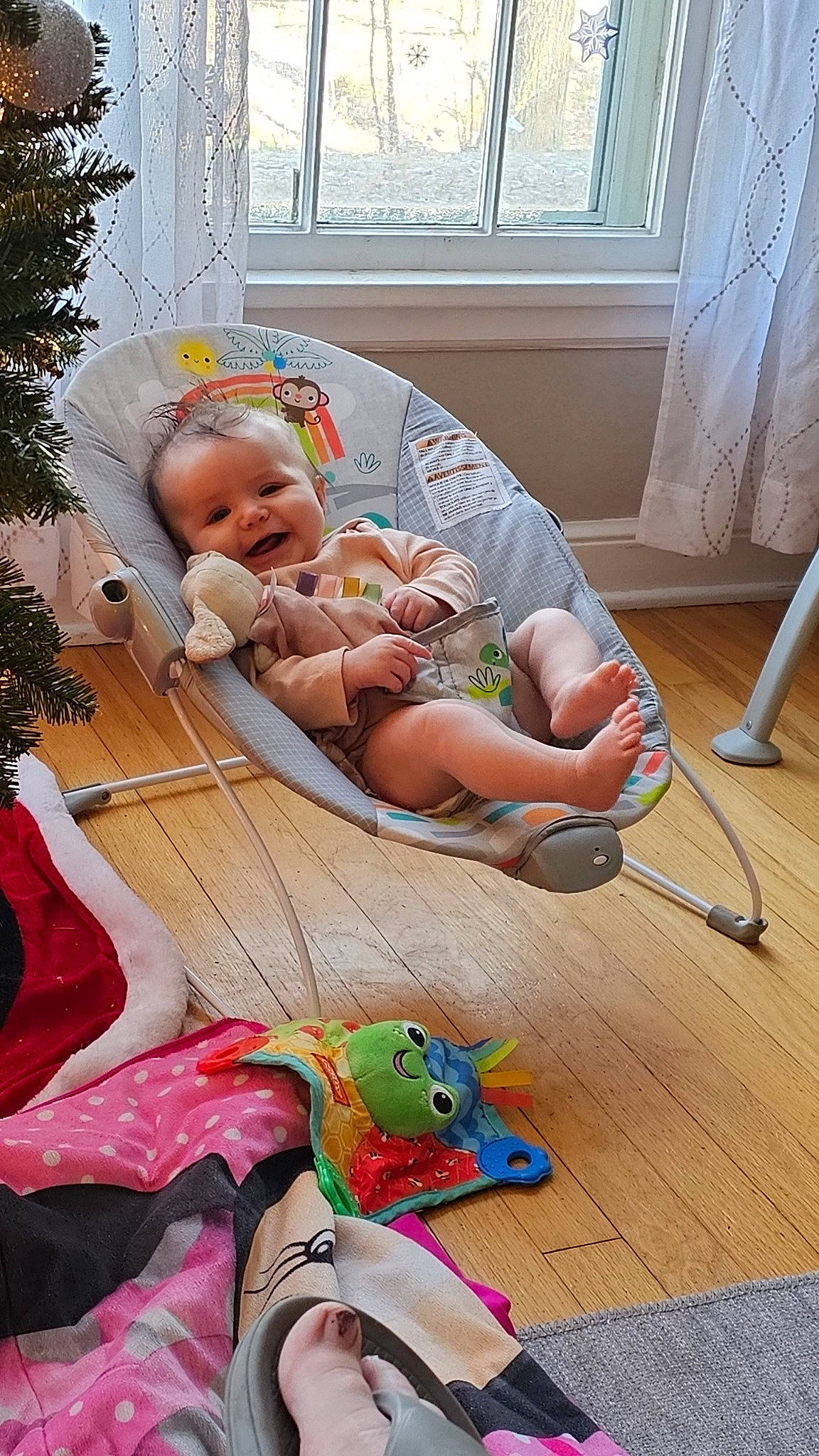 Bennit joined the competition — help win amazing prizes! baby, baby_products, baby_toddler_clothing, child, comfort, event, flooring, fun, grass, happy, hardwood, lap, leisure, person, room, sitting, smile, toddler, toy, window