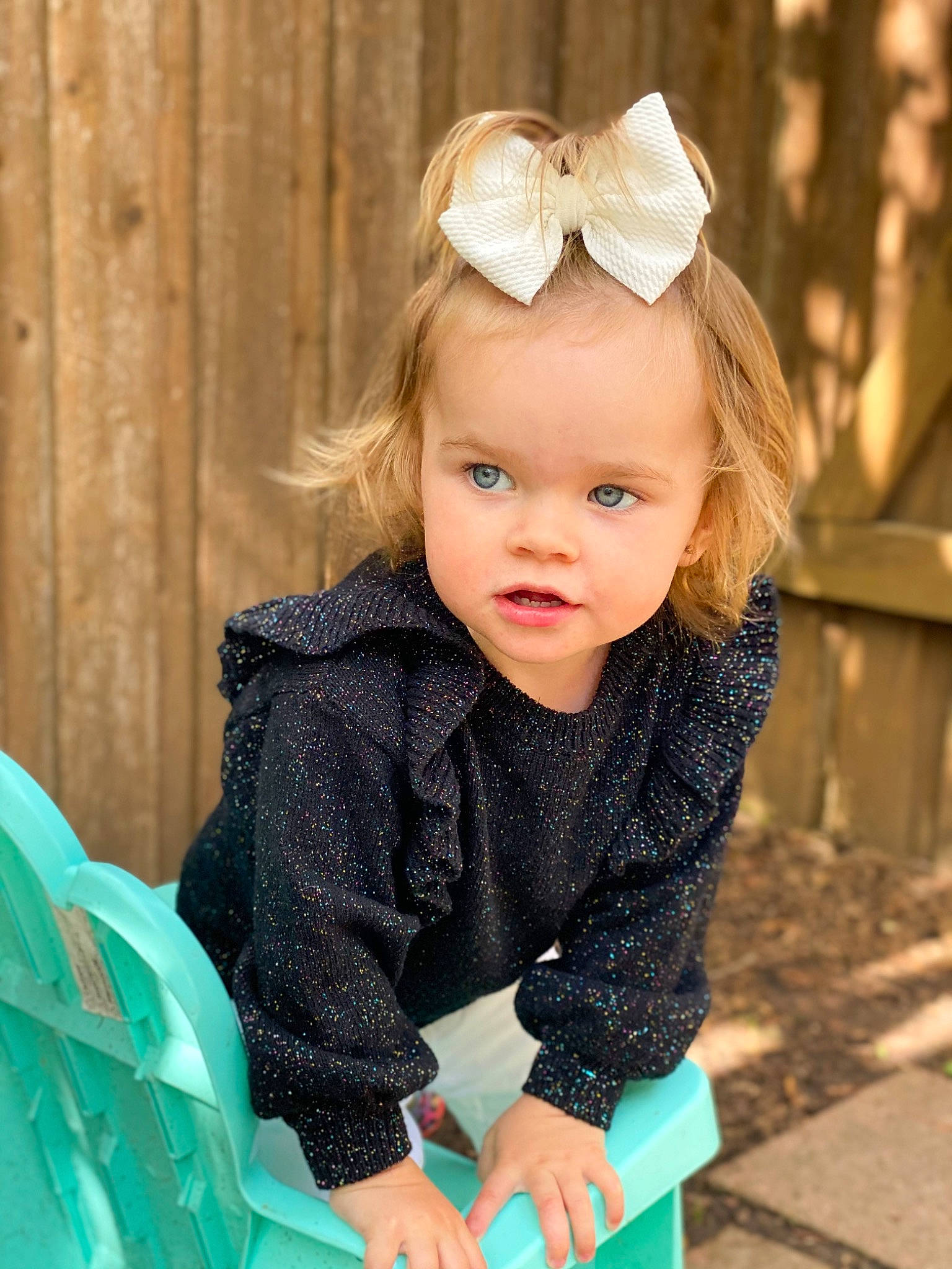 Aria is registered to the contest to win money with this photo: baby, baby_toddler_clothing, blond, child, dress, electric_blue, face, facial_expression, flash_photography, fun, grass, happy, headpiece, iris, leisure, pattern, people_in_nature, person, skin, sleeve