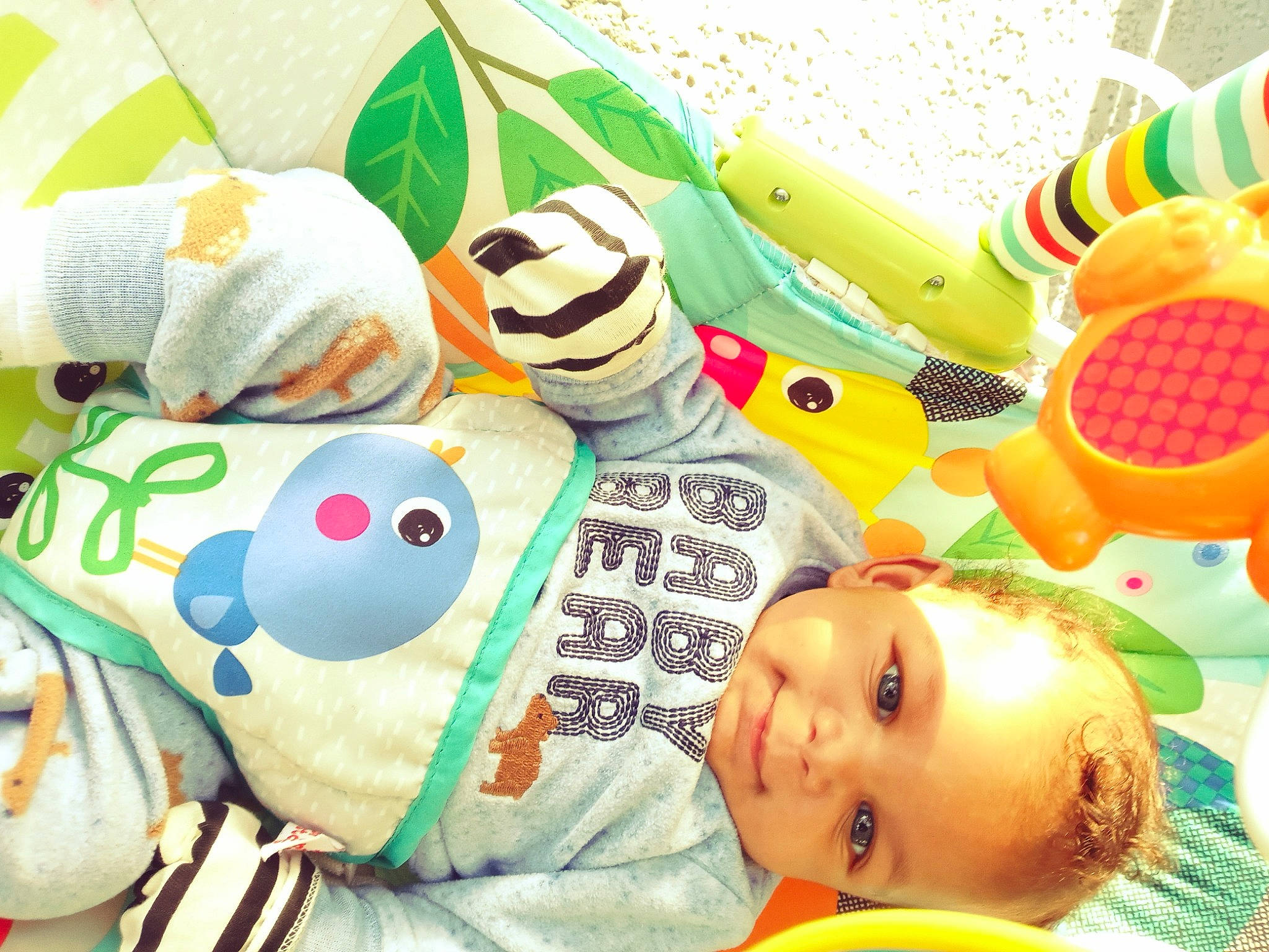 Zayden joined the competition — help win amazing prizes! art, baby, baby_products, baby_toddler_clothing, child, fun, green, happy, mammal, orange, organism, person, product, smile, snapshot, stuffed_toy, textile, toddler, toy, vertebrate