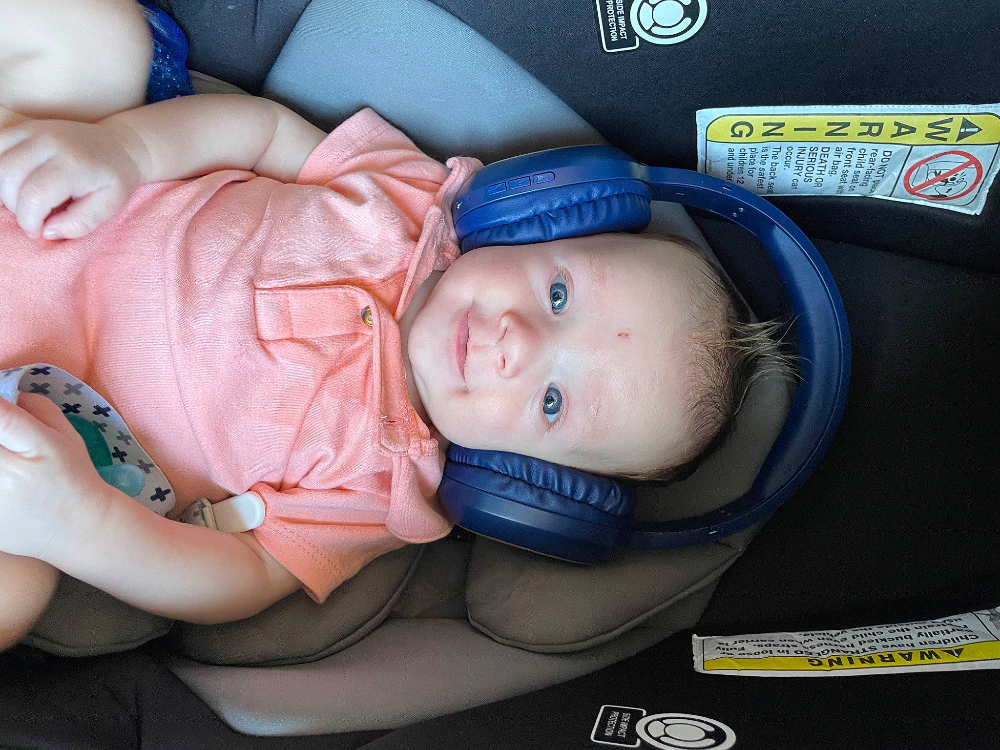 Graysen is registered to the contest to win money with this photo: auto_part, baby, baby_carriage, baby_in_car_seat, baby_products, baby_safety, baby_sleeping, baby_toddler_clothing, car_seat, cheek, chest, child, comfort, electric_blue, finger, nail, person, sitting, skin, thumb