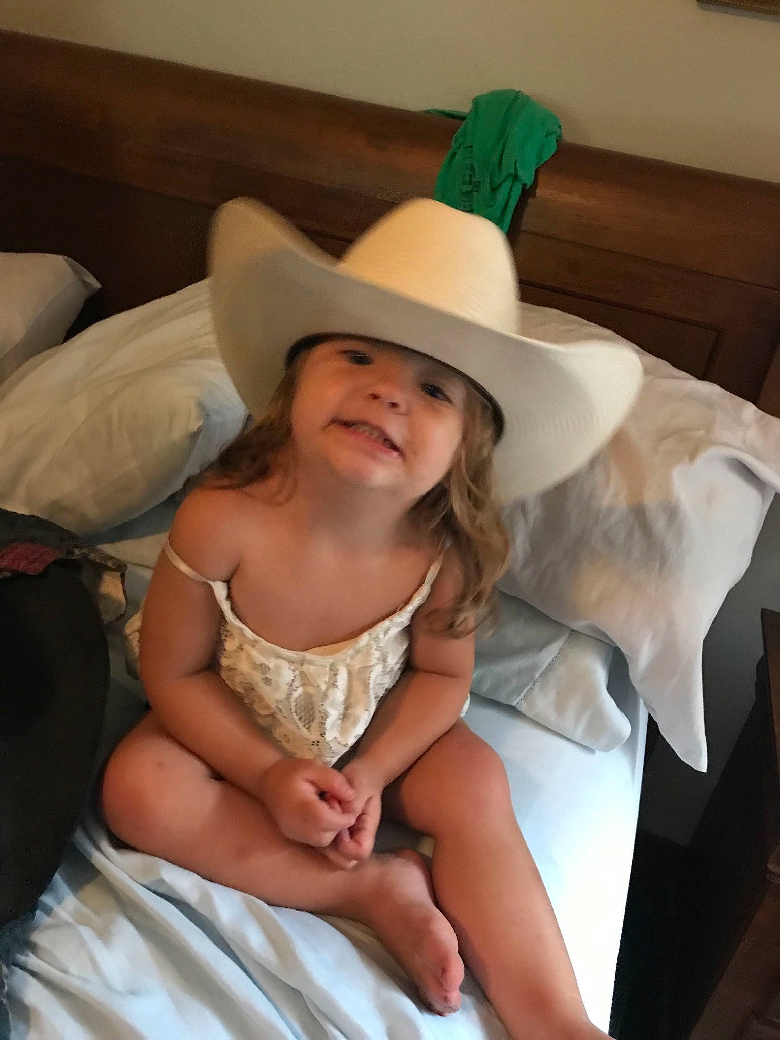 Jordyn is registered to the contest to win money with this photo: child, costume, fashion_accessory, hat, headgear, headwear, leg, person, smile, sun_hat