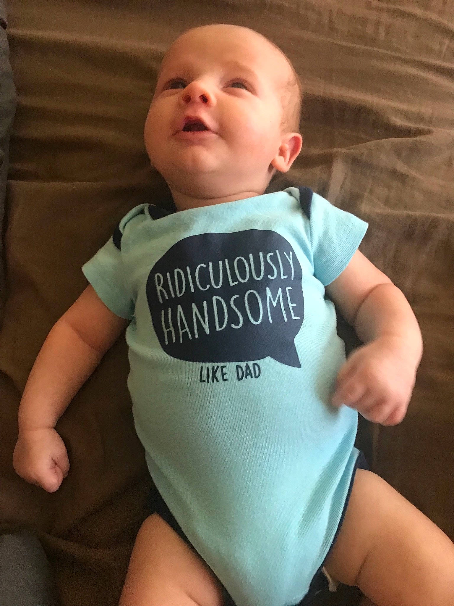 Beaux is registered to the contest to win money with this photo: arm, baby, baby_products, baby_toddler_clothing, child, person, product, sleeve, t_shirt, toddler