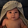 baby, infant, towel, elephant_hood, cute, face, portrait, child, skin, blanket, expression, eyes, headwear, indoor, person, newborn, soft, warm, adorable, curious