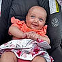 Lydia Rose joined the competition — help win amazing prizes! baby, infant, smiling, car_seat, blue_eyes, coral_clothing, floral_skirt, cute, happy, child, portrait, seat, hands, skin, young, person, closeup, indoors, soft_light, baby_fashion