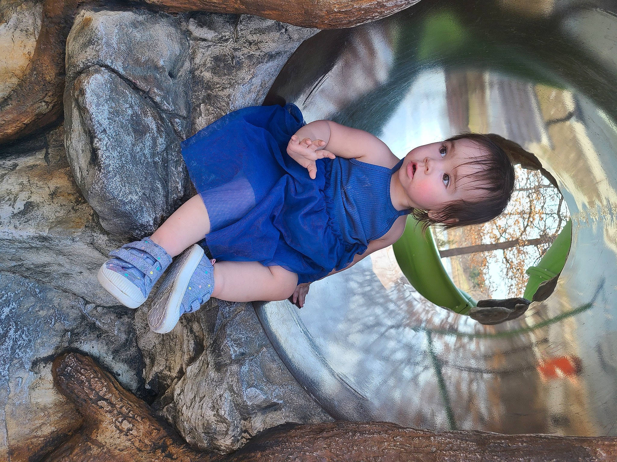 Valerie is registered to the contest to win money with this photo: baby, beauty, bedrock, child, electric_blue, flash_photography, fun, grass, leg, leisure, mammal, people_in_nature, person, recreation, shoe, sneakers, thigh, toddler, tree, vertebrate