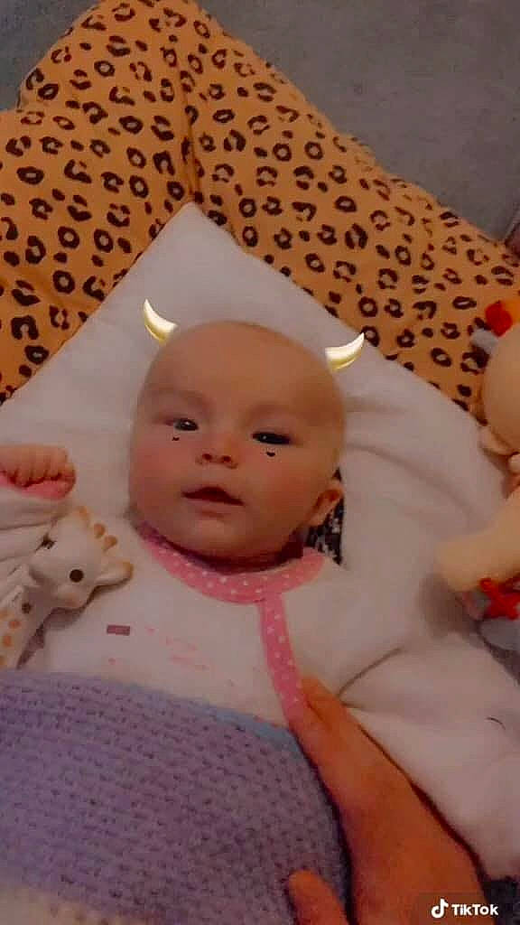 Kimberly participe au concours pour gagner de l'argent avec cette photo : baby, baby_products, baby_sleeping, baby_toddler_clothing, cheek, child, comfort, doll, happy, hat, headgear, linens, peach, person, pink, room, skin, thumb, toddler, toy