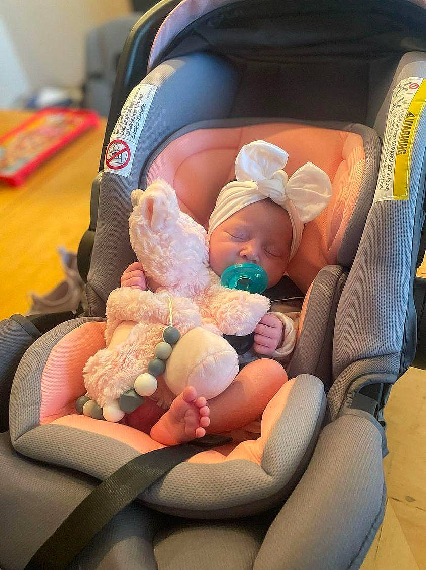 Leilani joined the competition — help win amazing prizes! baby, baby_carriage, baby_in_car_seat, baby_products, baby_sleeping, baby_toddler_clothing, car_seat, child, comfort, finger, fun, hat, head, human_body, lap, person, sitting, skin, thigh, thumb