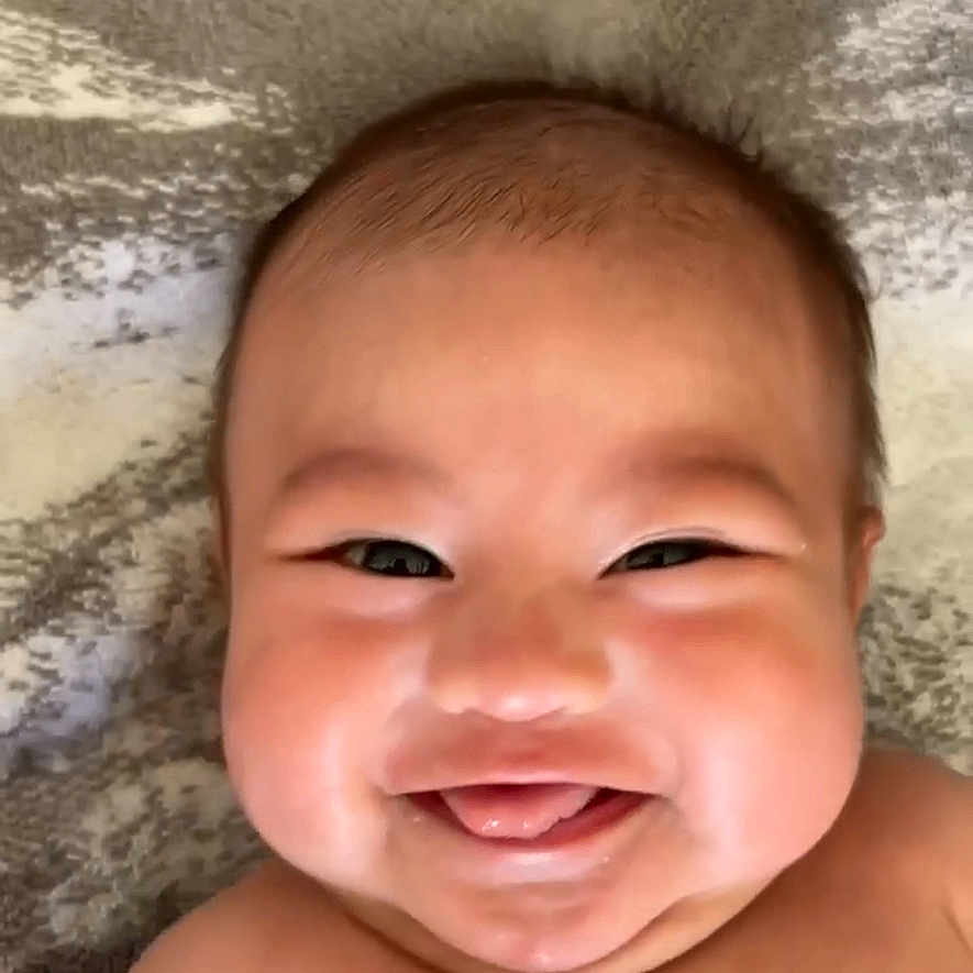 Rhian is registered to the contest to win money with this photo: baby, babylaughing, crying, face, happy, head, laughing, person, sad, smile