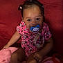 Amirez joined the competition — help win amazing prizes! baby, child, pacifier, pink_blanket, red_couch, onesie, minnie_mouse, pigtails, hair_ties, socks, smiling, indoor, cute, infant, seated, happy, portrait, soft_texture, toddler, toy