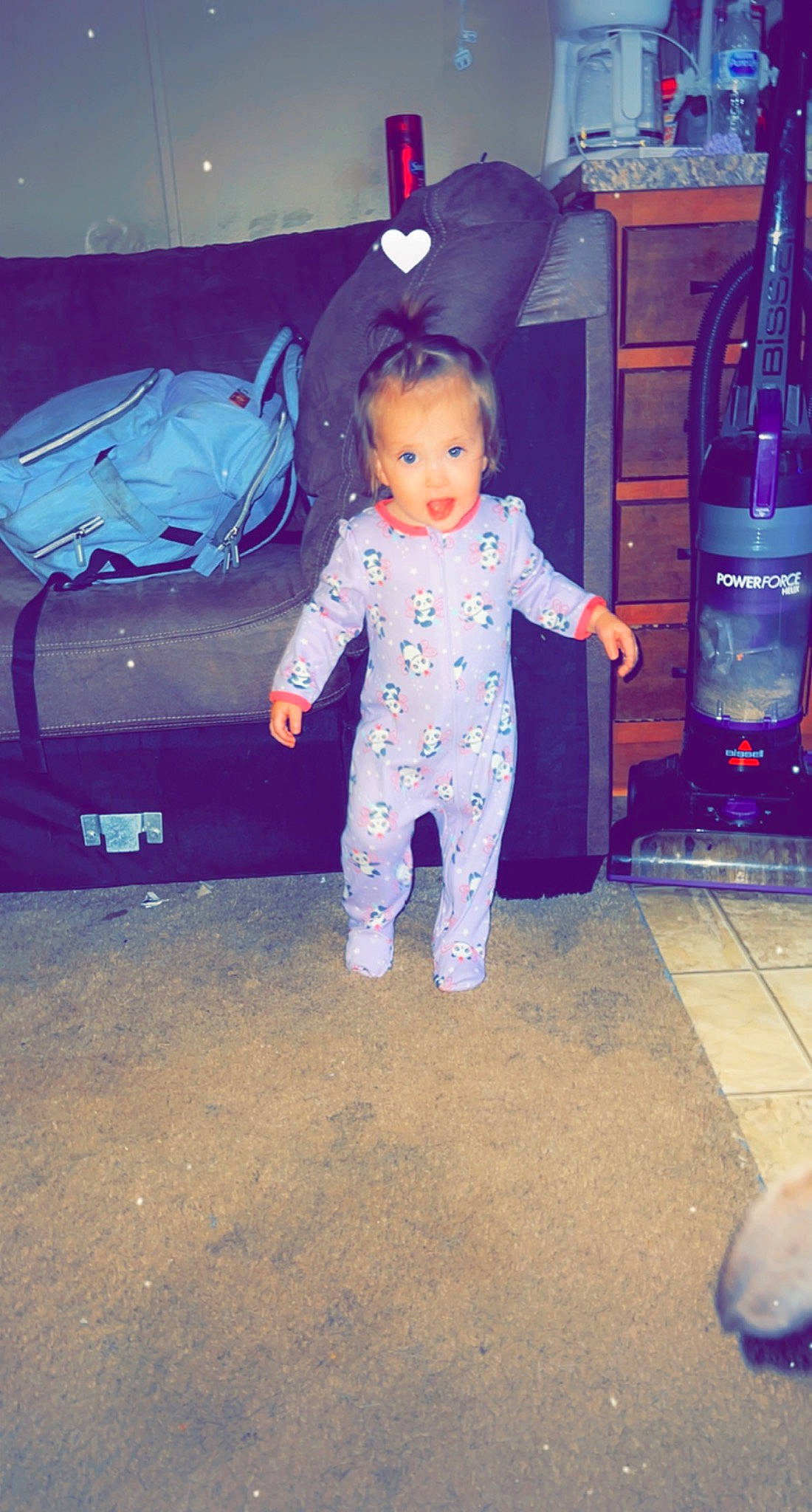 Raven is registered to the contest to win money with this photo: baby, baby_toddler_clothing, blue, child, cool, electric_blue, eye, flooring, fun, happy, home_appliance, person, pink, purple, red, sitting, sleeve, snapshot, toddler, trunk