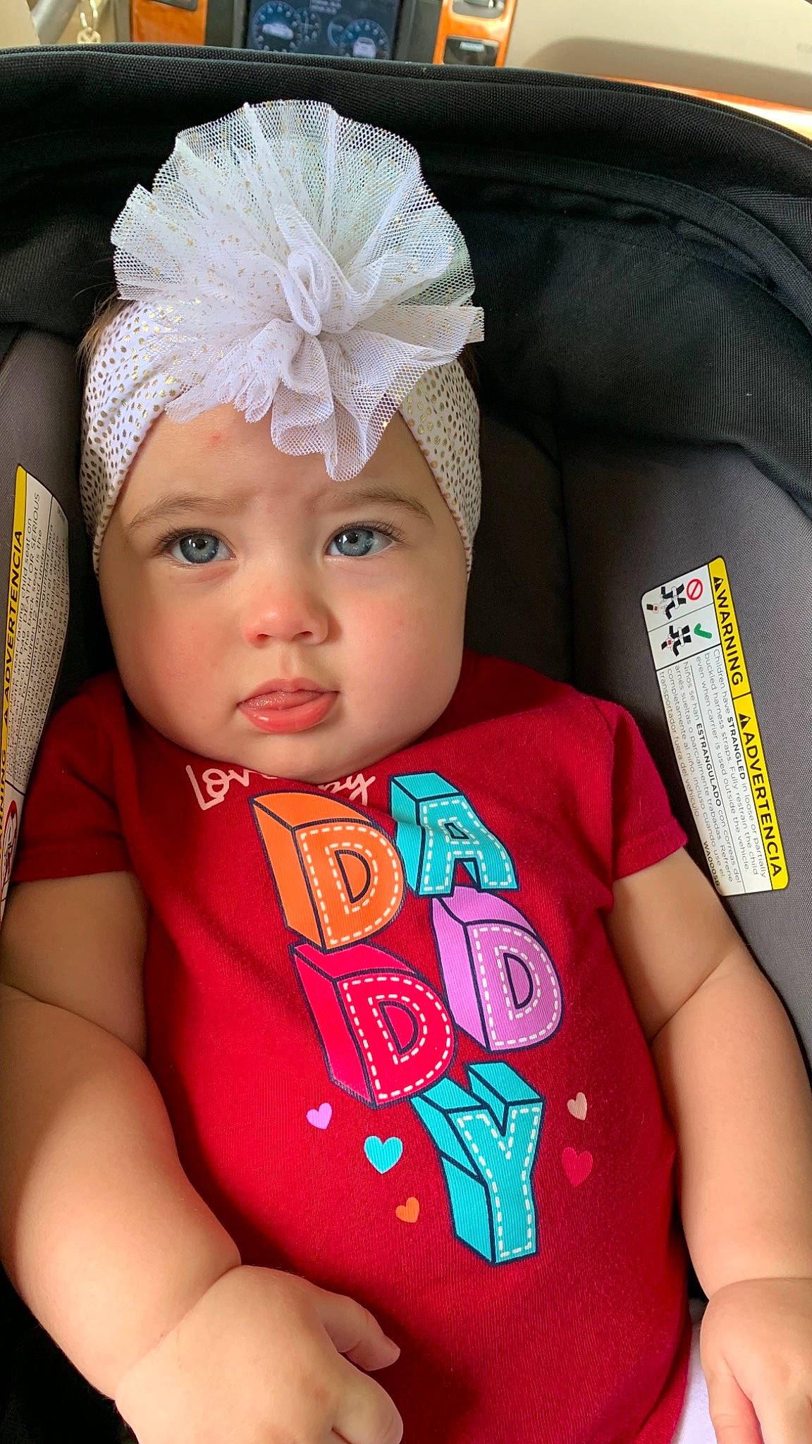Amelie joined the competition — help win amazing prizes! baby, baby_toddler_clothing, cap, child, chin, costume_hat, eyebrow, eyelash, fashion_accessory, hair_accessory, happy, headband, headpiece, headwear, jewellery, magenta, neck, pattern, person, pink