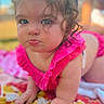 Rosalea joined the competition — help win amazing prizes! baby, infant, child, portrait, sitting, crawling, pink_outfit, ruffles, curly_hair, blue_eyes, serious_expression, face, hands, blanket, colorful, indoor, close_up, photography, sunlight, background_blur
