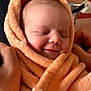 Léna a rejoint le concours — aidez-le/la à gagner de superbes lots ! baby, blanket, child, cozy, cuddly, face, hands, infant, orange, person, portrait, resting, skin, sleeping, smile, soft, toddler, warm, wrapped, young