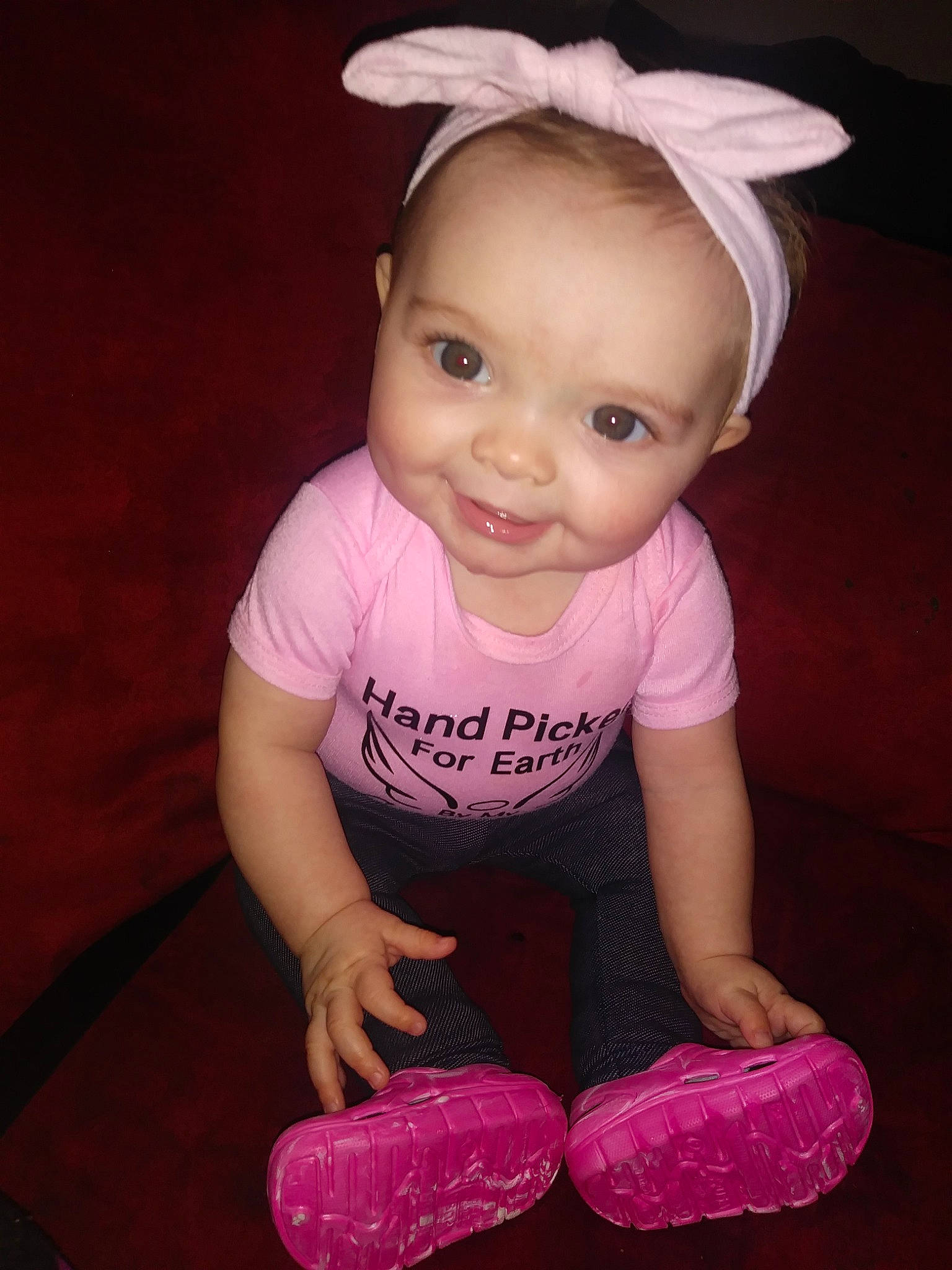 Ellasyn is registered to the contest to win money with this photo: baby, baby_products, baby_toddler_clothing, cheek, child, ear, eye, footwear, hair_accessory, head, headgear, joy, organ, person, pink, play, product, purple, sitting, skin