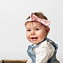 baby, cheeks, child, clothing, cute, denim, eyes, face, happy, headband, infant, innocence, overalls, person, pink, portrait, smile, studio, white_background, young