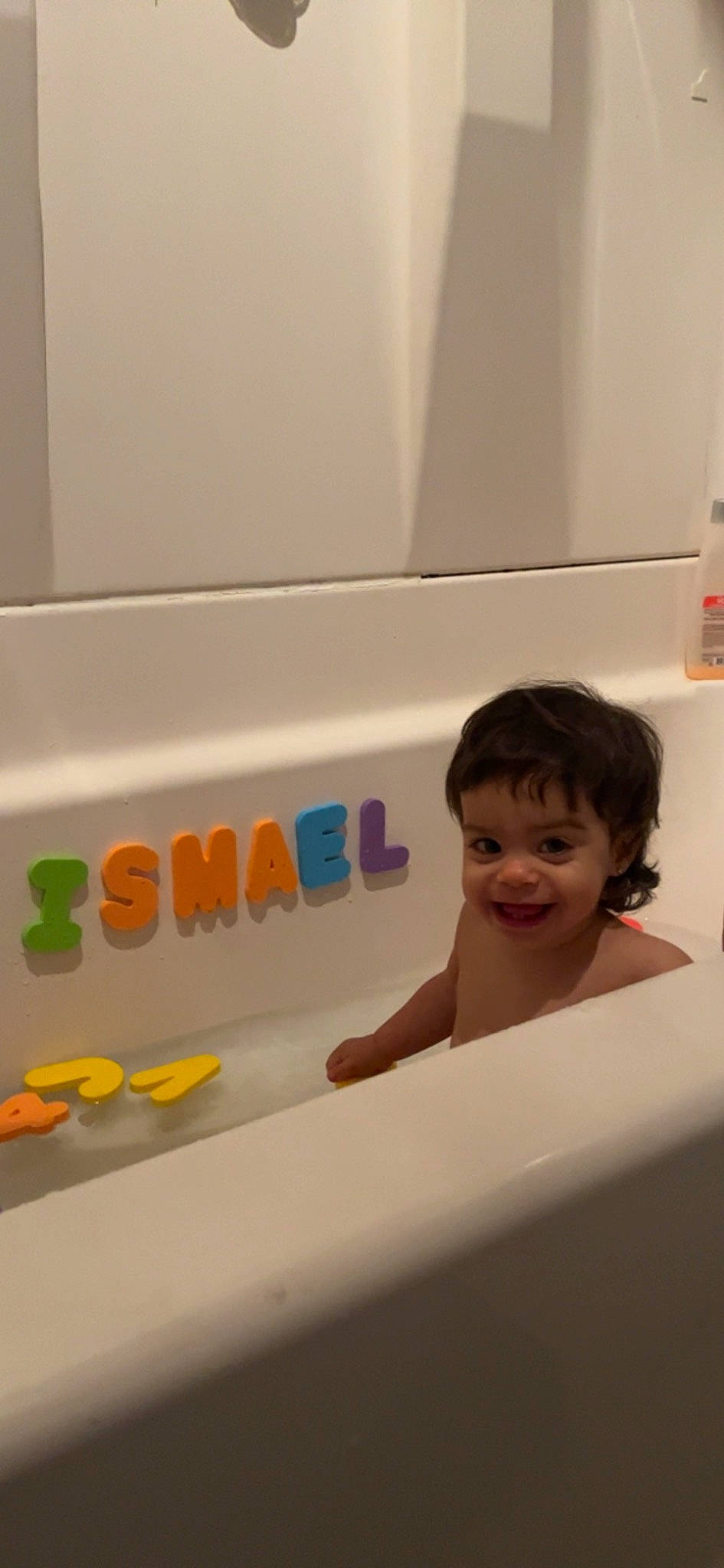 Ismael joined the competition — help win amazing prizes! automotive_exterior, baby, bathing, bathroom, bathtub, child, composite_material, flooring, fluid, fun, gas, happy, joy, person, plumbing, plumbing_fixture, room, smile, toddler