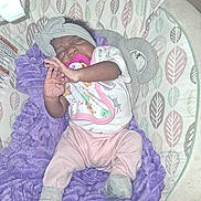 Jakayla joined the competition — help win amazing prizes! baby, infant, pacifier, blanket, headband, socks, baby_seat, leaf_pattern, purple_blanket, sleeping, cozy, cute, child, newborn, clothing, indoor, soft_texture, stretching, resting, comfort