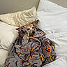 animal, bed, blanket, comfort, cozy, cute, dog, fur, halloween, indoor, pattern, pet, pillow, pumpkin, relaxed, resting, sleepy, small_dog, soft, wrapped
