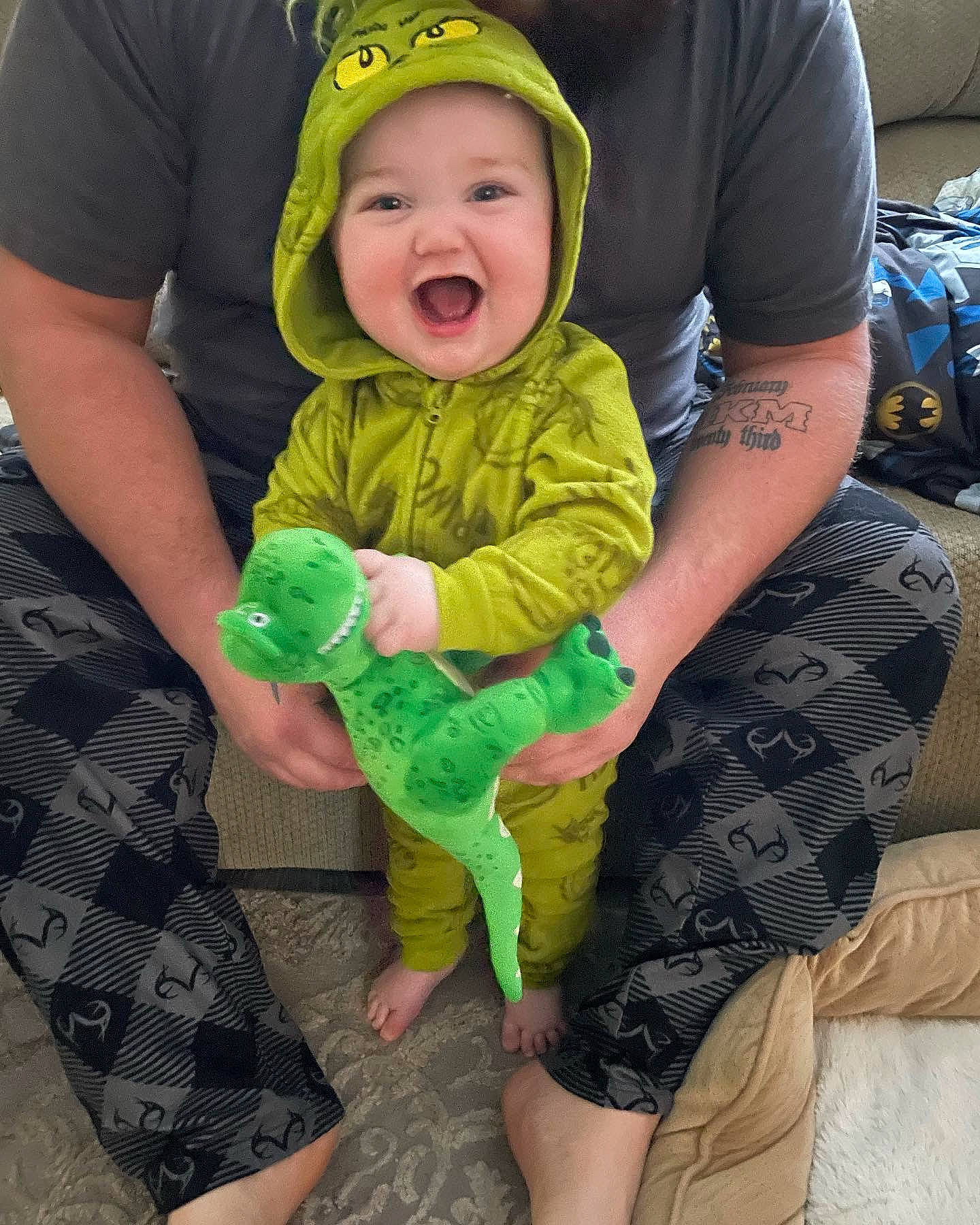 Hank joined the competition — help win amazing prizes! baby, baby_products, baby_toddler_clothing, baseball_cap, cap, child, face, foot, fun, grass, green, happy, hat, headwear, lap, person, personal_protective_equipment, recreation, sitting, smile