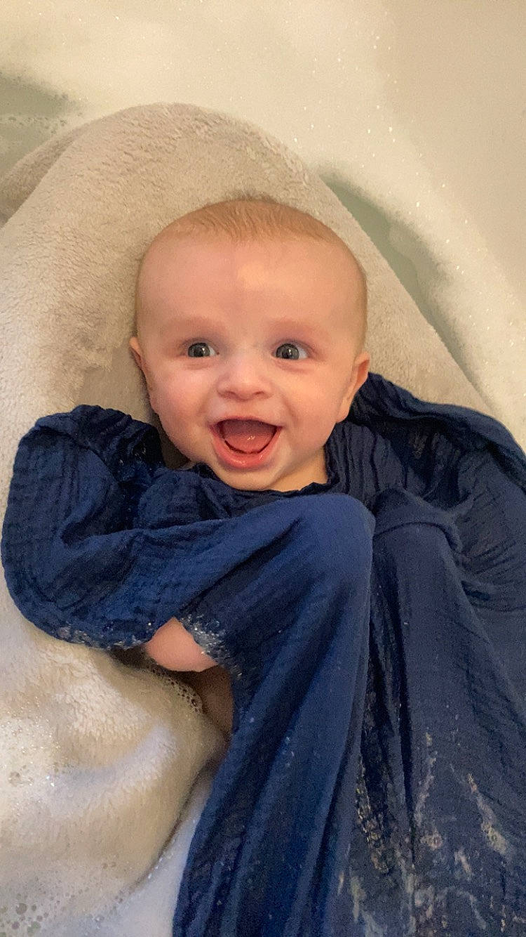 Alfie is registered to the contest to win money with this photo: baby, baby_toddler_clothing, cheek, child, chin, comfort, eye, eyebrow, face, flash_photography, happy, iris, linens, lip, nose, outerwear, person, skin, sleeve, smile