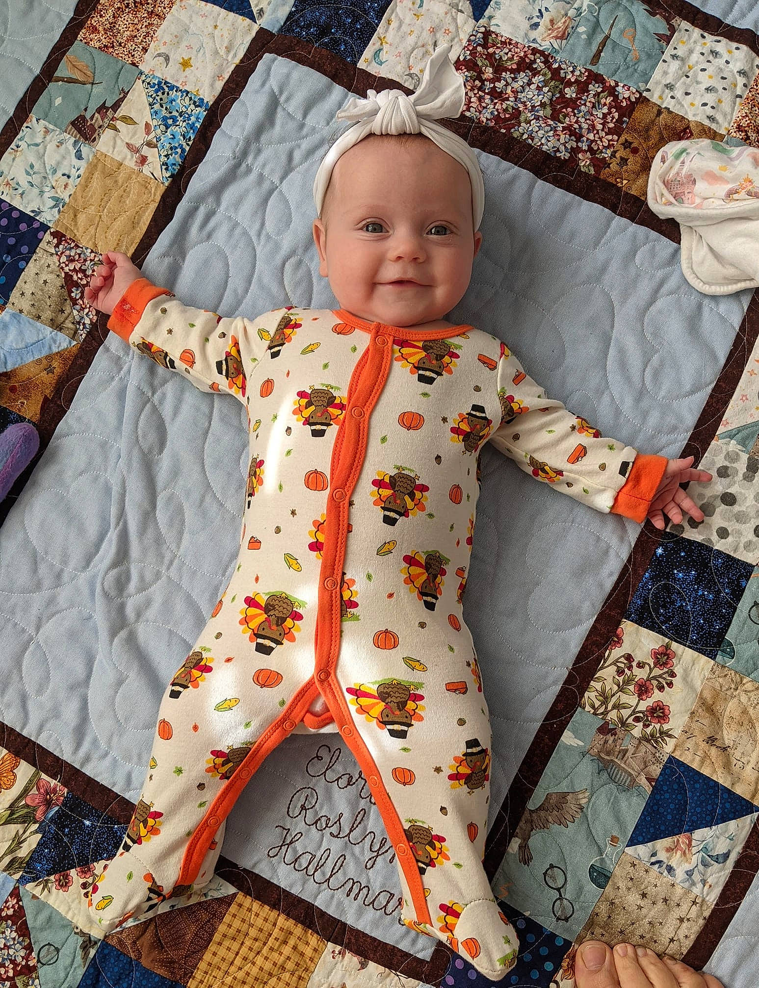 Elora joined the competition — help win amazing prizes! baby, baby_products, baby_toddler_clothing, cheek, child, joy, linens, mouth, nightwear, nose, pattern, peach, person, quilt, sleeve, textile, toddler