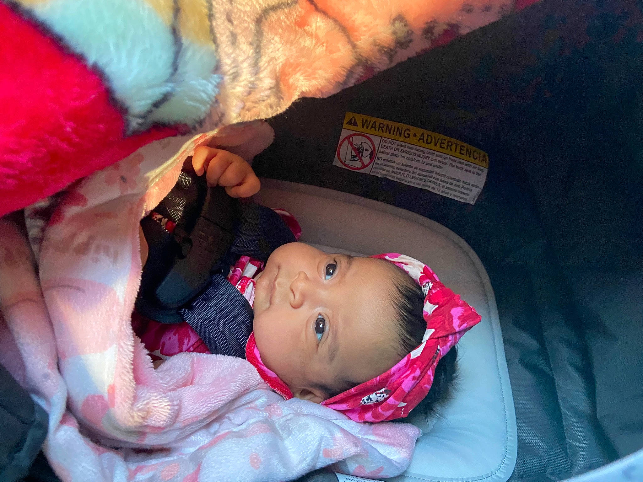 Annalise is registered to the contest to win money with this photo: baby, baby_carriage, baby_products, baby_toddler_clothing, beauty, cheek, child, comfort, eye, finger, fun, head, mammal, mouth, person, pink, product, red, skin, textile