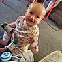 Nevaeh is registered to the contest to win money with this photo: baby, bodypart, boy, child, couch, cream, dessert, face, finger, food, furniture, hand, happy, head, icing, male, person, photography, portrait, sitting