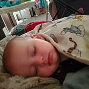 Nevaeh joined the competition — help win amazing prizes! baby, bed, blanket, bonnet, box, clothing, cradle, crib, cushion, face, furniture, hat, head, homedecor, infantbed, linen, newborn, person, sleeping, towel