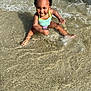 toddler, child, water, beach, splashing, swimsuit, happy, playful, sunlight, sand, waves, outdoor, summer, fun, person, smiling, nature, vacation, sea, young