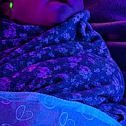 Meila joined the competition — help win amazing prizes! baby, sleeping, blanket, floral_pattern, purple_light, blue_light, cozy, infant, wrapped, cute, peaceful, indoors, portrait, child, soft_texture, resting, night, warm, toddler, face