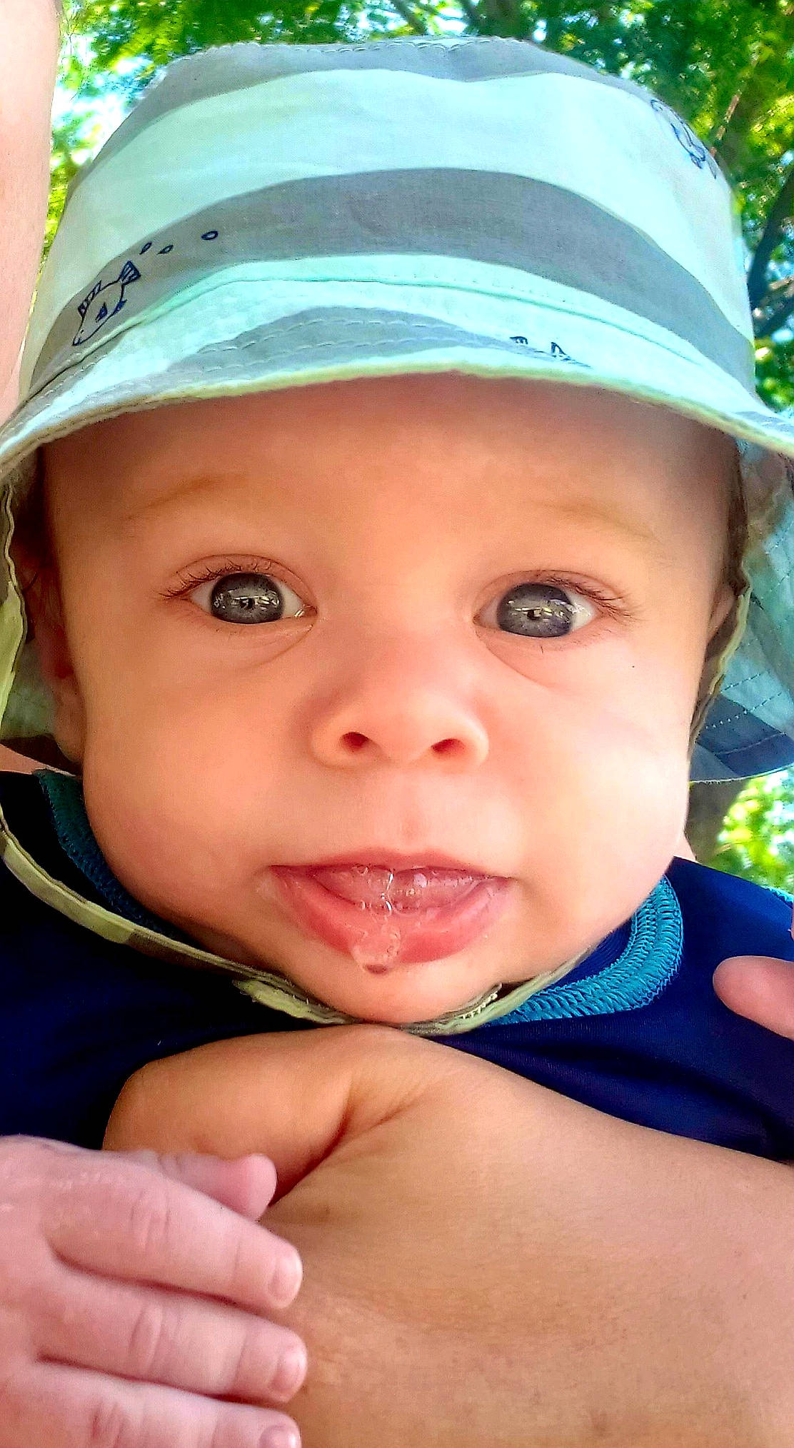 Reese is registered to the contest to win money with this photo: baby, cheek, child, chin, face, facial_expression, head, headgear, headwear, lip, mouth, nose, person, skin, smile, toddler