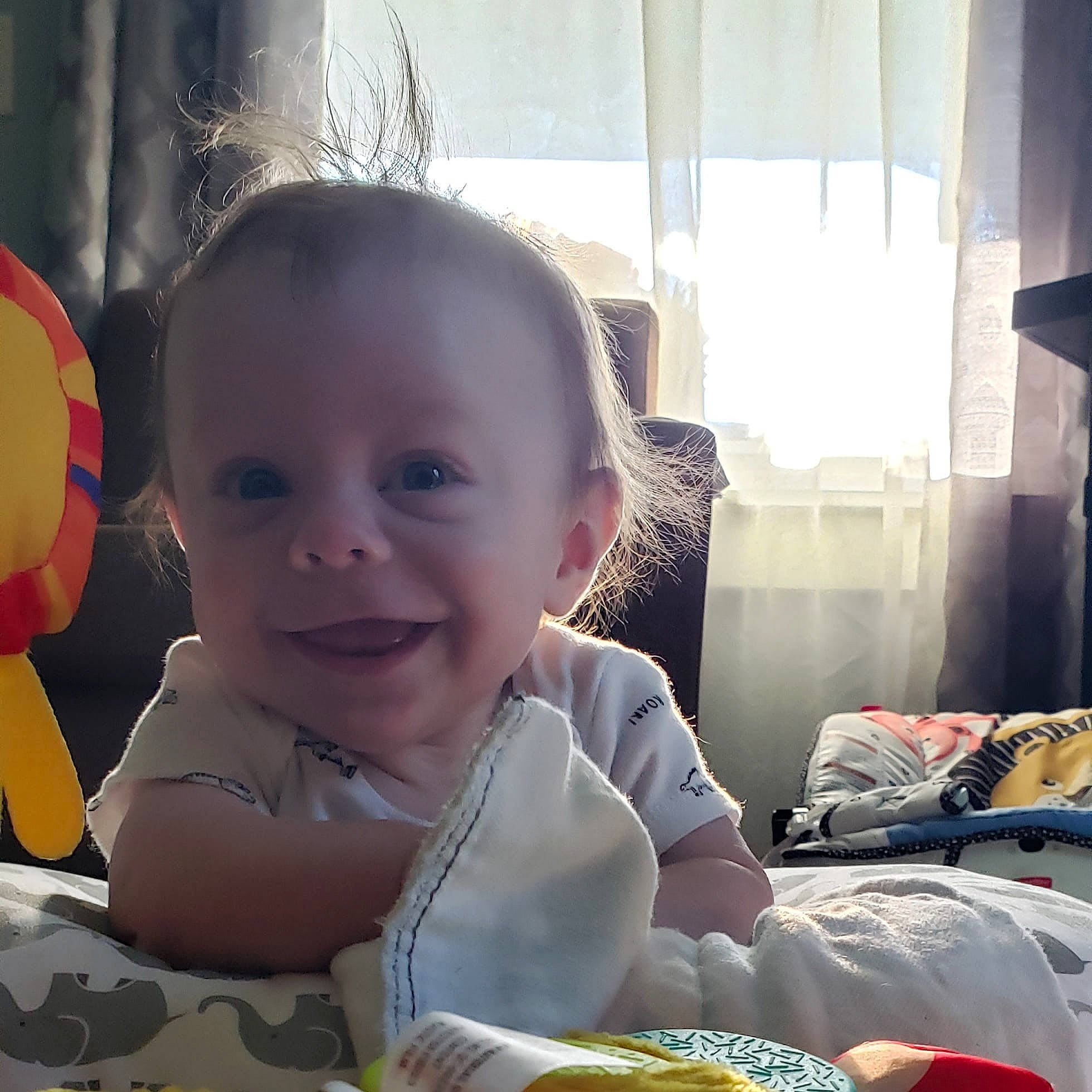 Reese is registered to the contest to win money with this photo: baby, cheek, child, eating, eye, face, happy, head, joy, person, play, sitting, smile, snapshot, toddler