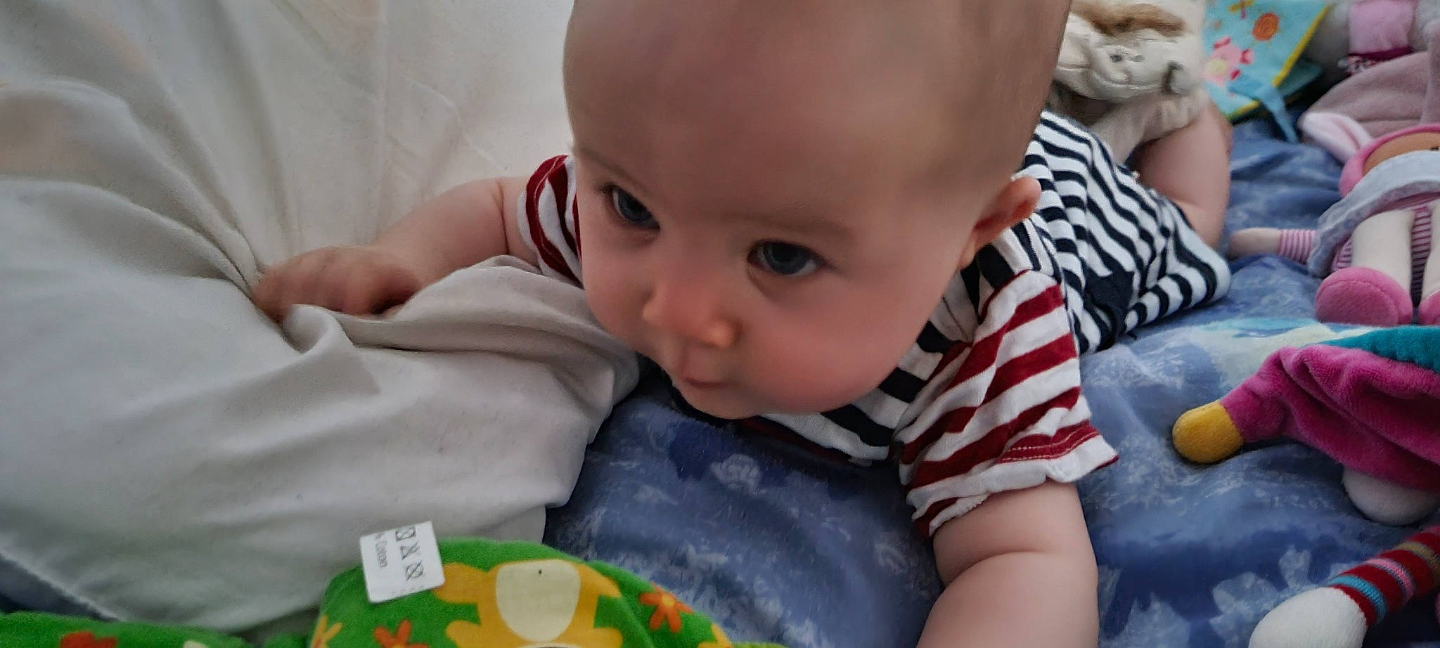 Myriam participe au concours pour gagner de l'argent avec cette photo : baby, baby_toddler_clothing, cheek, child, chin, eye, face, flooring, hair, happy, head, human_body, iris, mouth, nose, person, skin, smile, toddler, toy