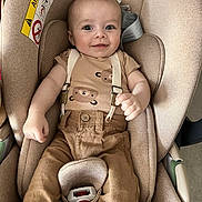 Maylone participe au concours pour gagner de l'argent avec cette photo : baby, child, car_seat, smiling, suspenders, brown_pants, beige, cute, infant, seatbelt, happy, clothing, person, portrait, indoors, baby_boy, sitting, cute_baby, car, safety