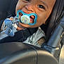 baby, pacifier, car_seat, child, smiling, infant, seatbelt, closeup, face, happy, sunlight, cute, child_seat, clothing, straps, indoors, person, head, mouth, expression