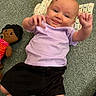 Freya joined the competition — help win amazing prizes! baby, black_shorts, carpet, casual_clothing, child, crocheted_blanket, cute, doll, face, floor, hands_up, happy, indoor, infant, lying_down, person, playtime, purple_shirt, smiling, toy