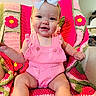 Presley joined the competition — help win amazing prizes! baby, child, smiling, pink_clothing, headband, bow, crocheted_blanket, flower_pattern, sitting, indoors, cute, happy, infant, arm, legs, skin, face, eyes, nose, mouth