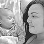 Natalie is registered to the contest to win money with this photo: baby, woman, sleeping, knit_sweater, blanket, black_and_white, portrait, face, love, tenderness, cozy, closeup, mother, infant, peaceful, cuddling, resting, indoor, smile, person