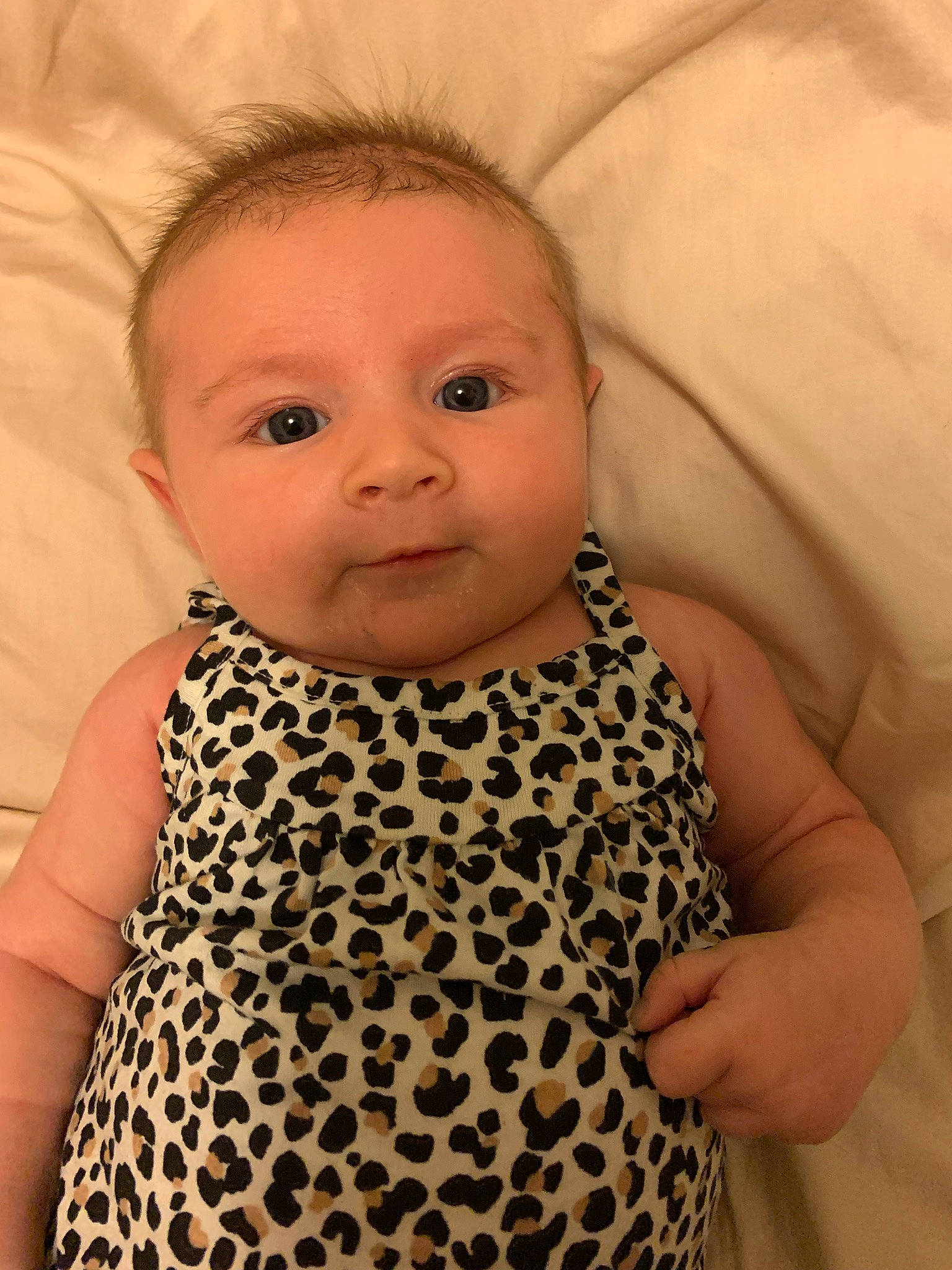 Giana is registered to the contest to win money with this photo: baby, baby_toddler_clothing, cheek, chin, comfort, dress, eye, eyebrow, eyelash, face, facial_expression, hairstyle, head, iris, lip, neck, nose, person, skin, sleeve