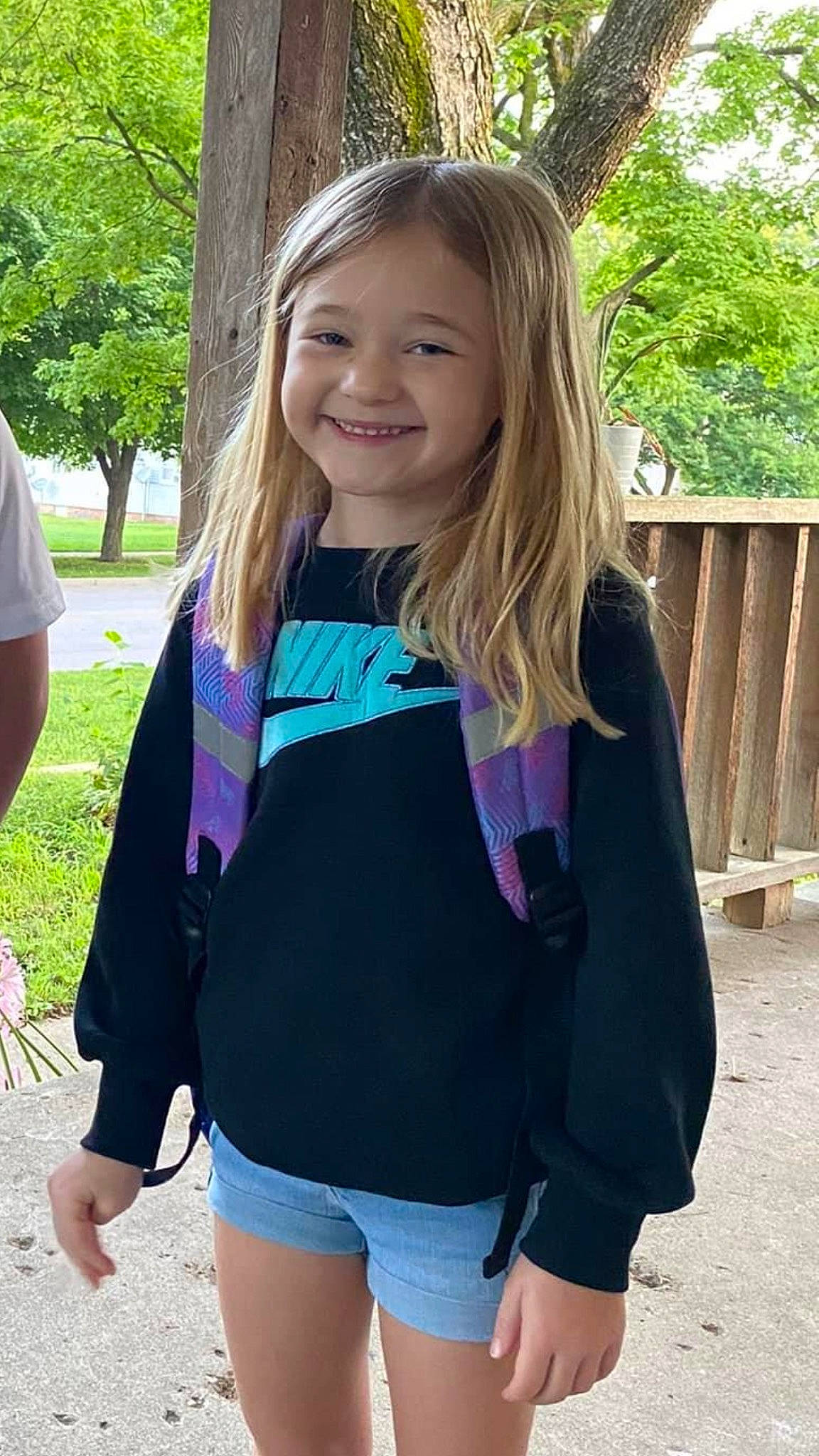 Kenleigh is registered to the contest to win money with this photo: abdomen, blond, brown_hair, electric_blue, event, happy, joy, long_hair, magenta, person, pink, plant, purple, sleeve, smile, sportswear, summer, t_shirt, thigh, tree