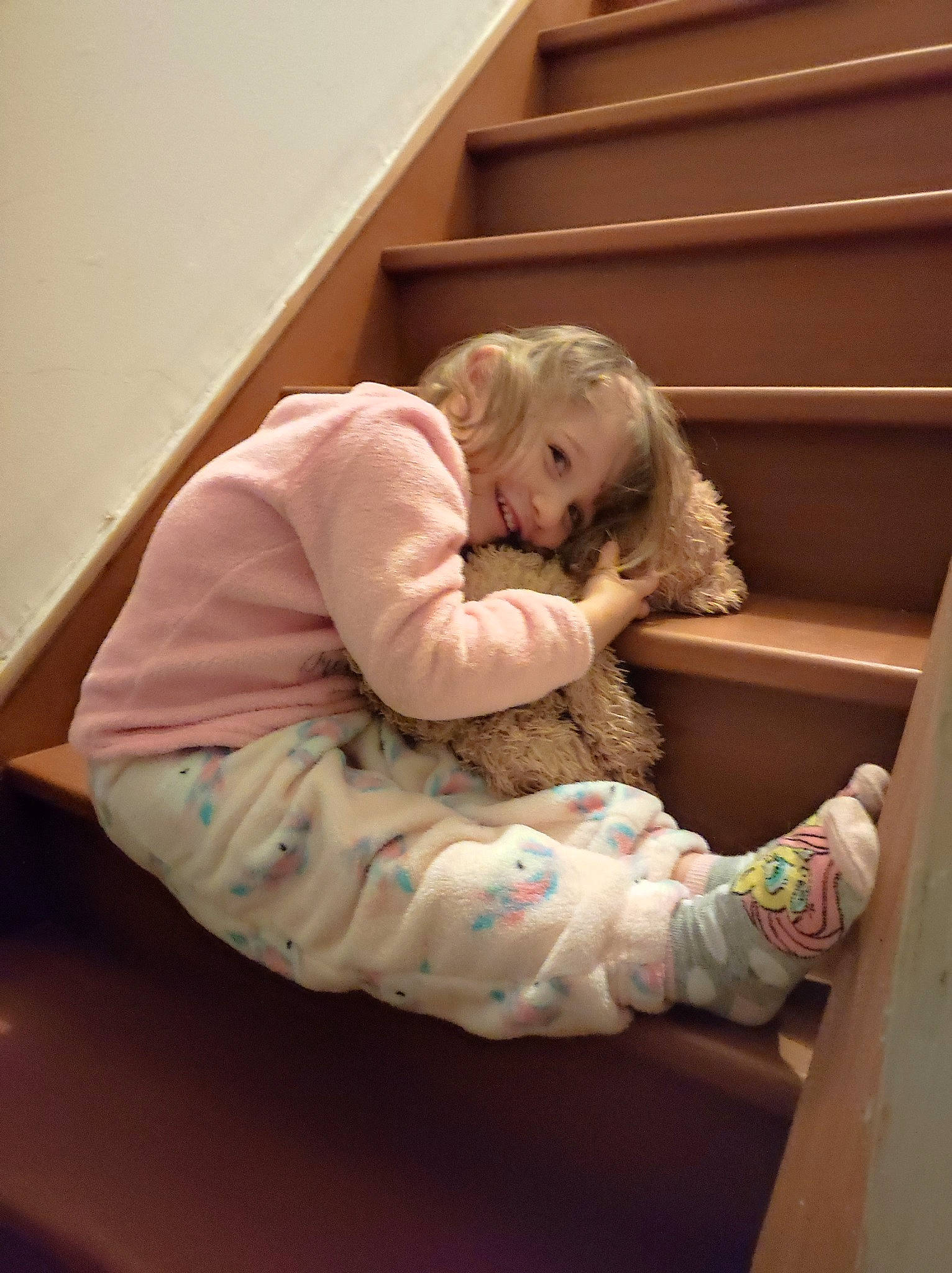 Nahomie participe au concours pour gagner de l'argent avec cette photo : baby, baby_toddler_clothing, blond, child, comfort, elbow, flooring, foot, fun, fur, human_body, human_leg, joy, knee, mammal, person, room, sitting, sock, thigh